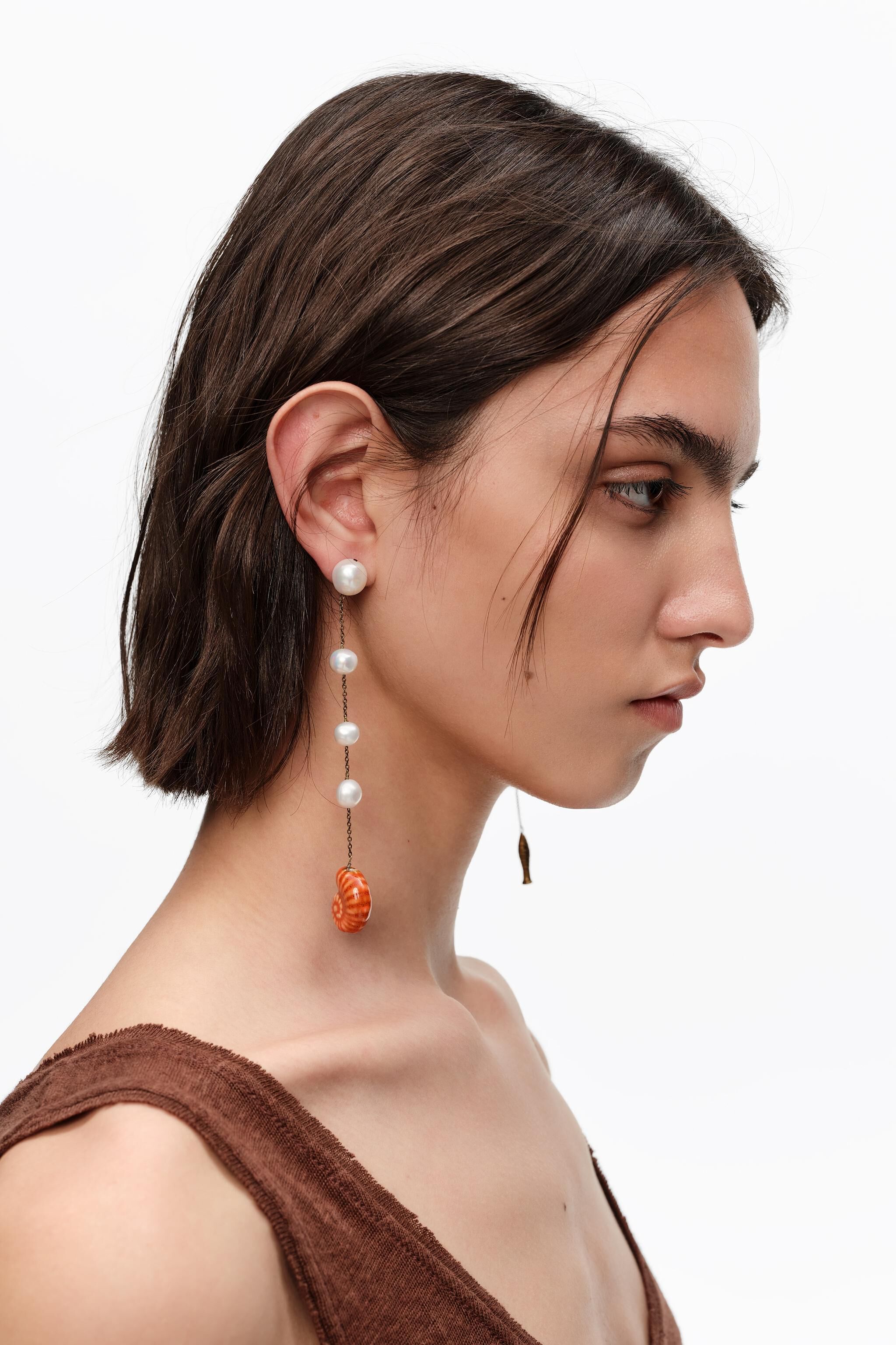 Pearl earrings with ceramic fish and seashell