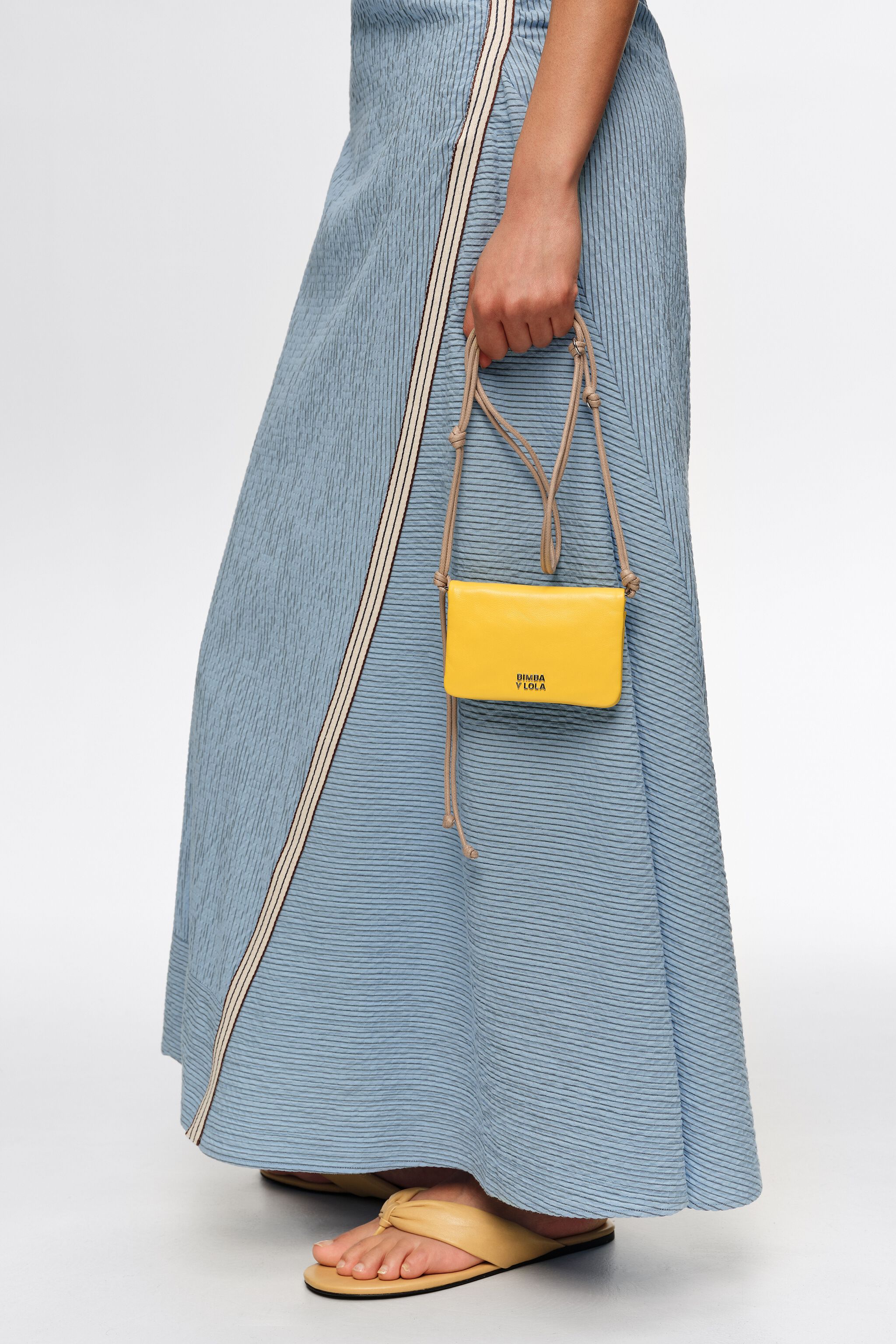 Small yellow leather flap purse