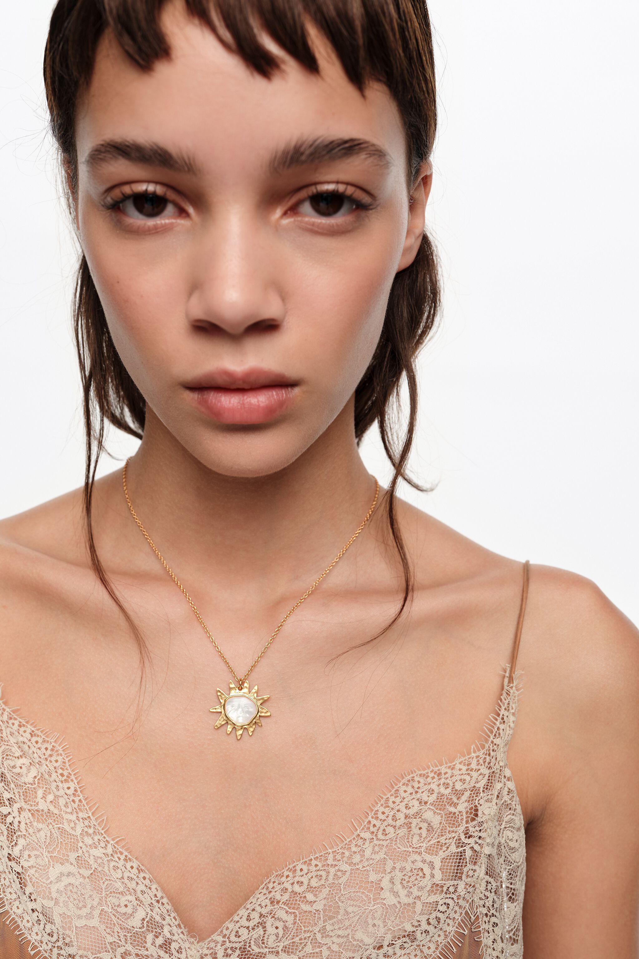 Brushed gold mother-of-pearl sun necklace