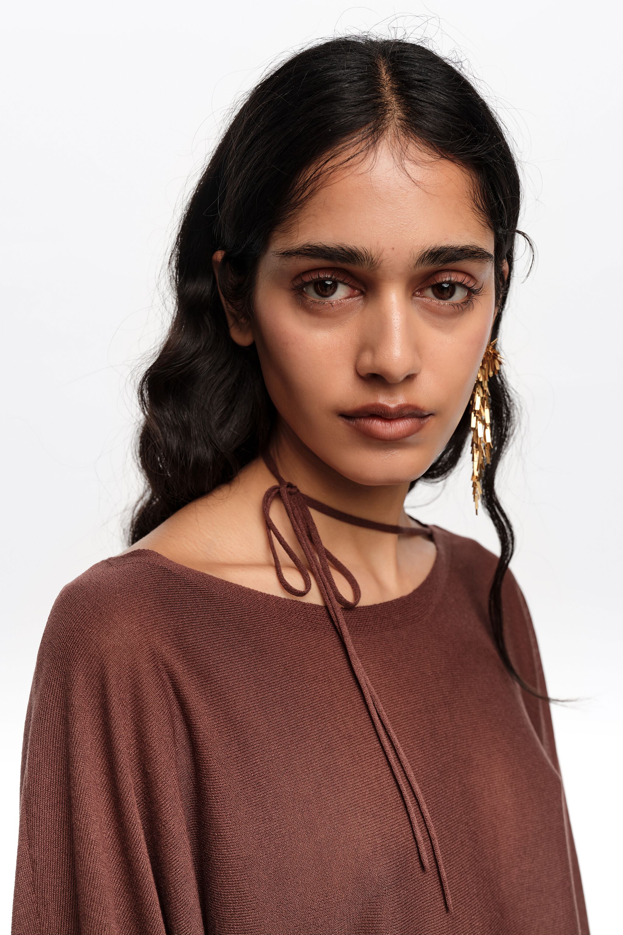 Brown boat neckline crossover ties sweater