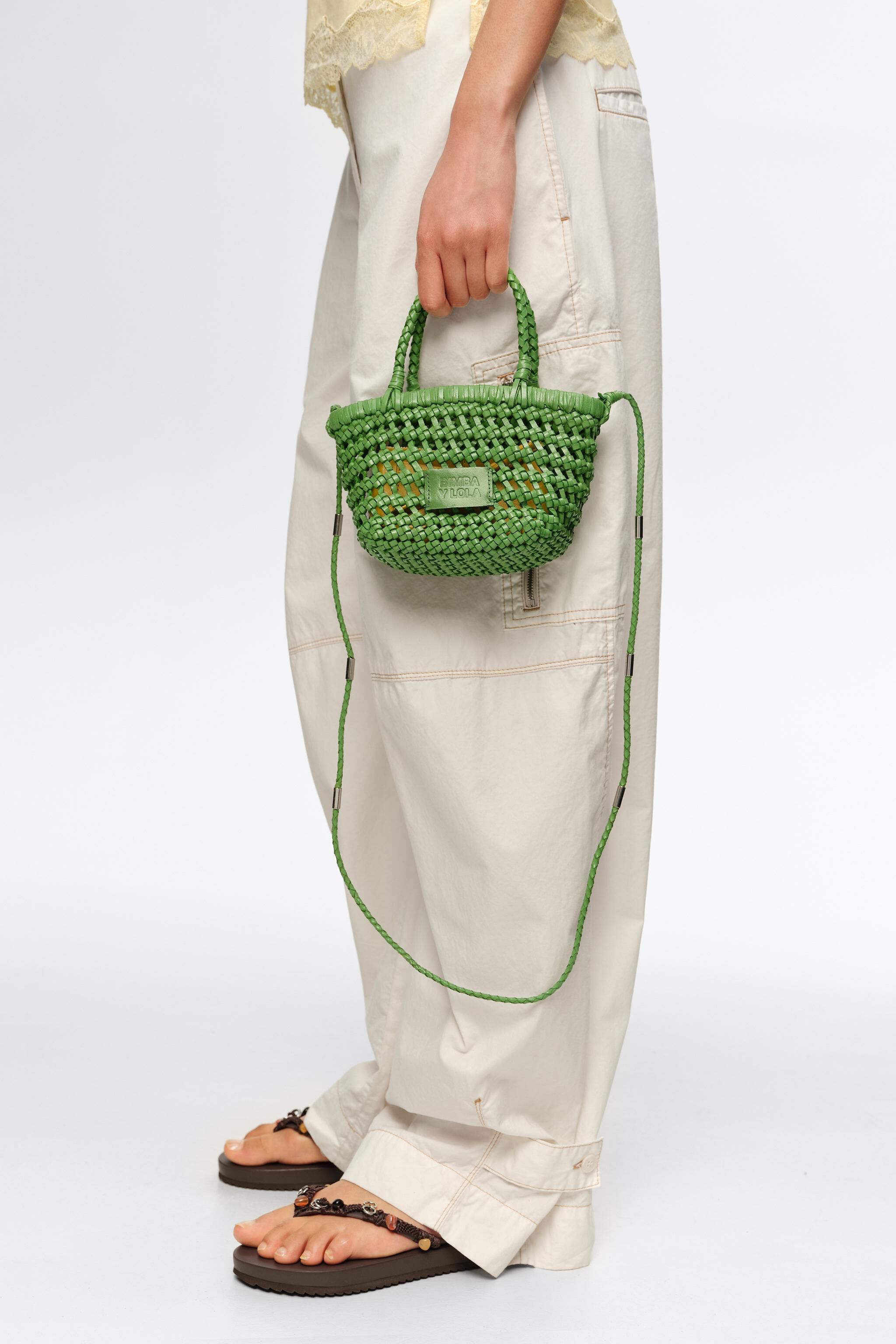 Mini emerald leather plaited crossbody bag