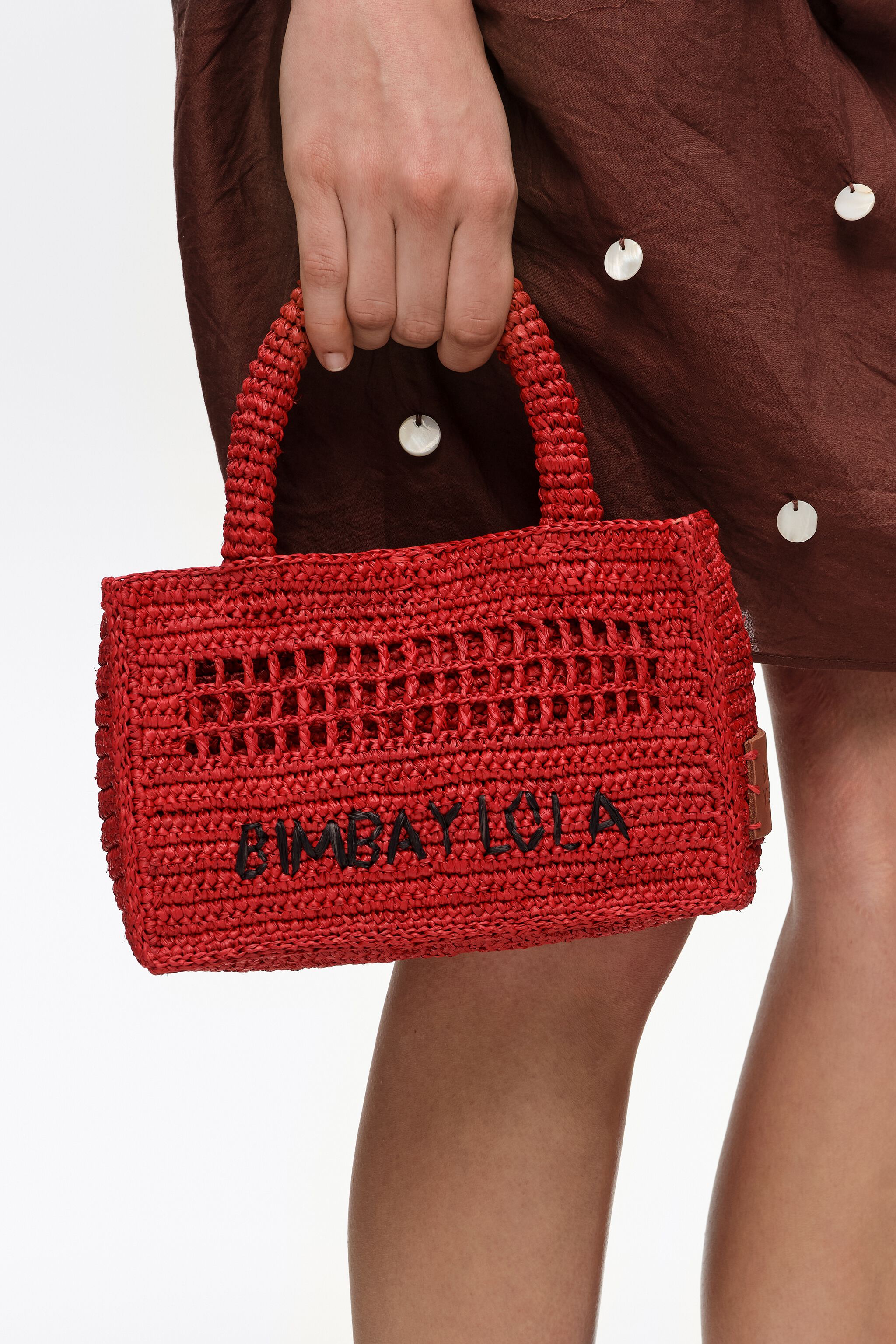 Red raffia plaited mini bag