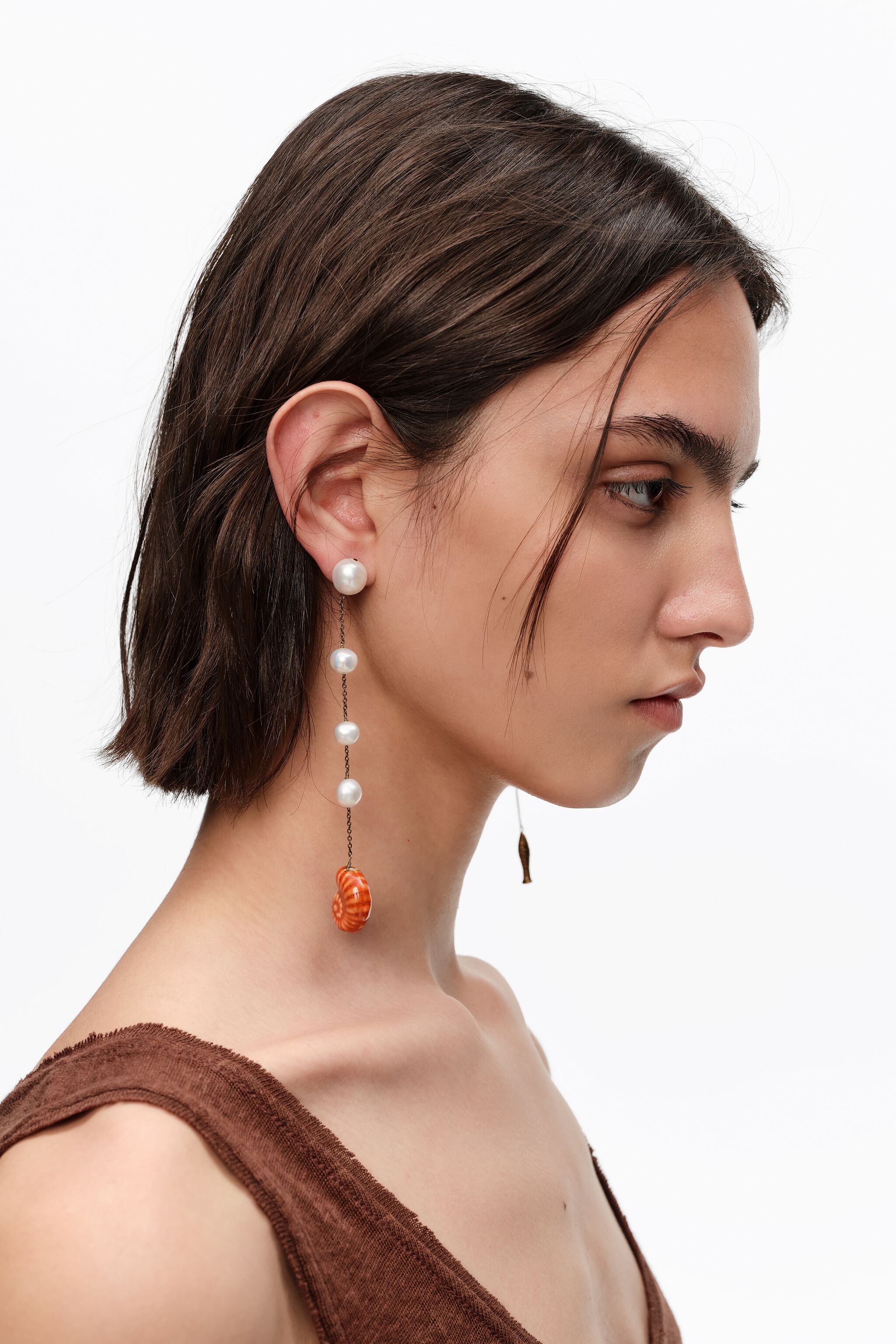 Pearl earrings with ceramic fish and seashell
