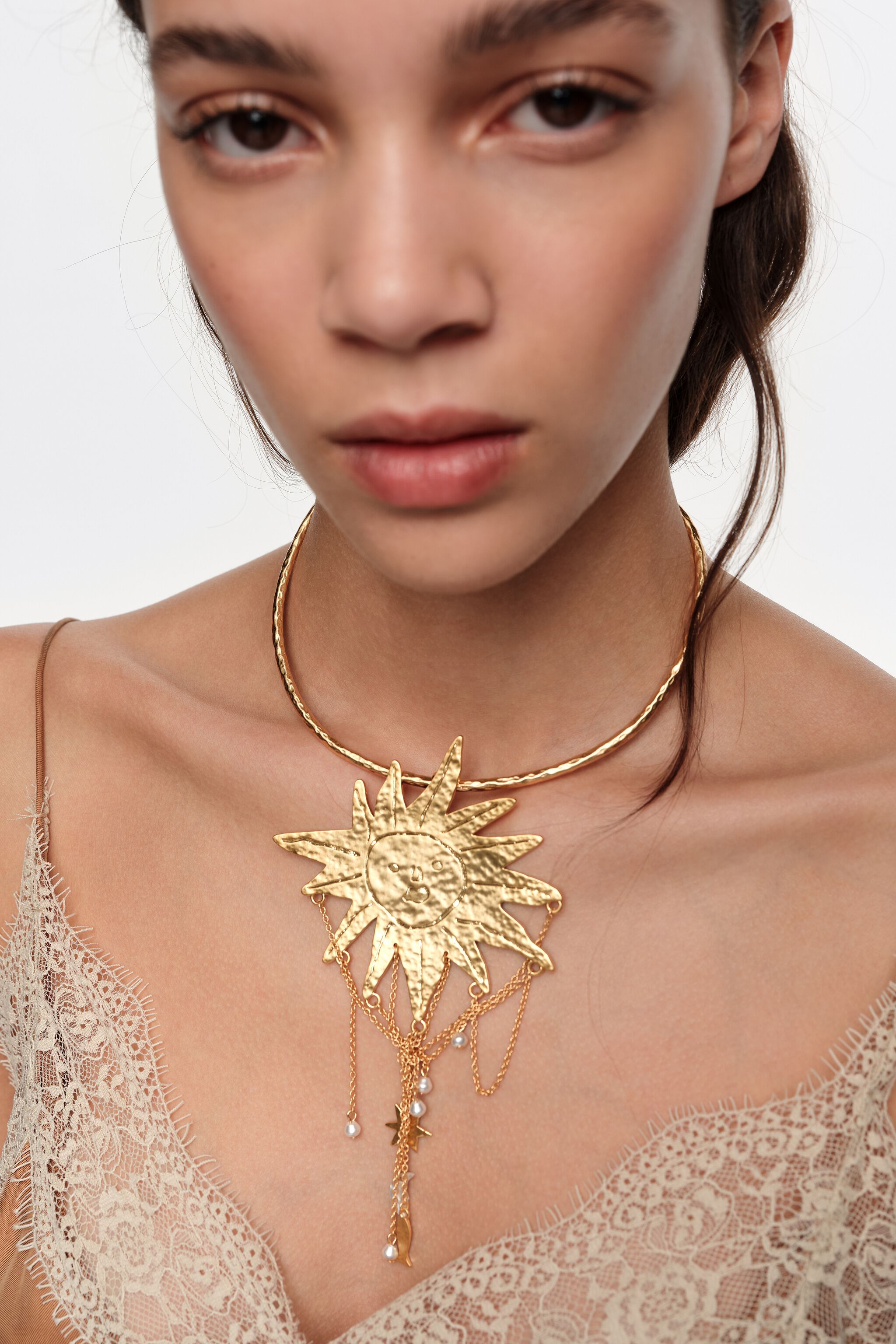 Sun and moon necklace with brushed gold chains and pearls
