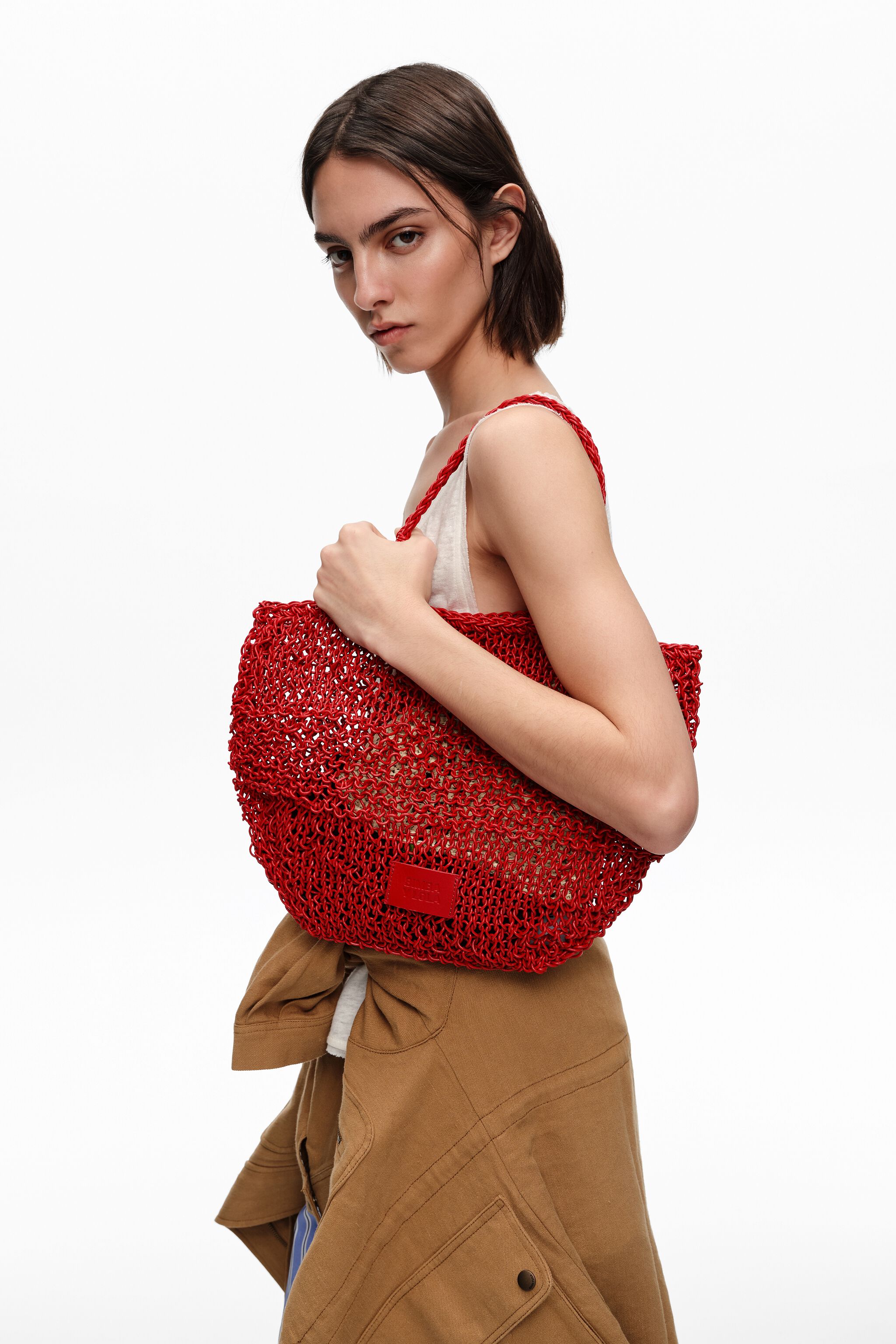 Medium red plaited leather shoulder bag