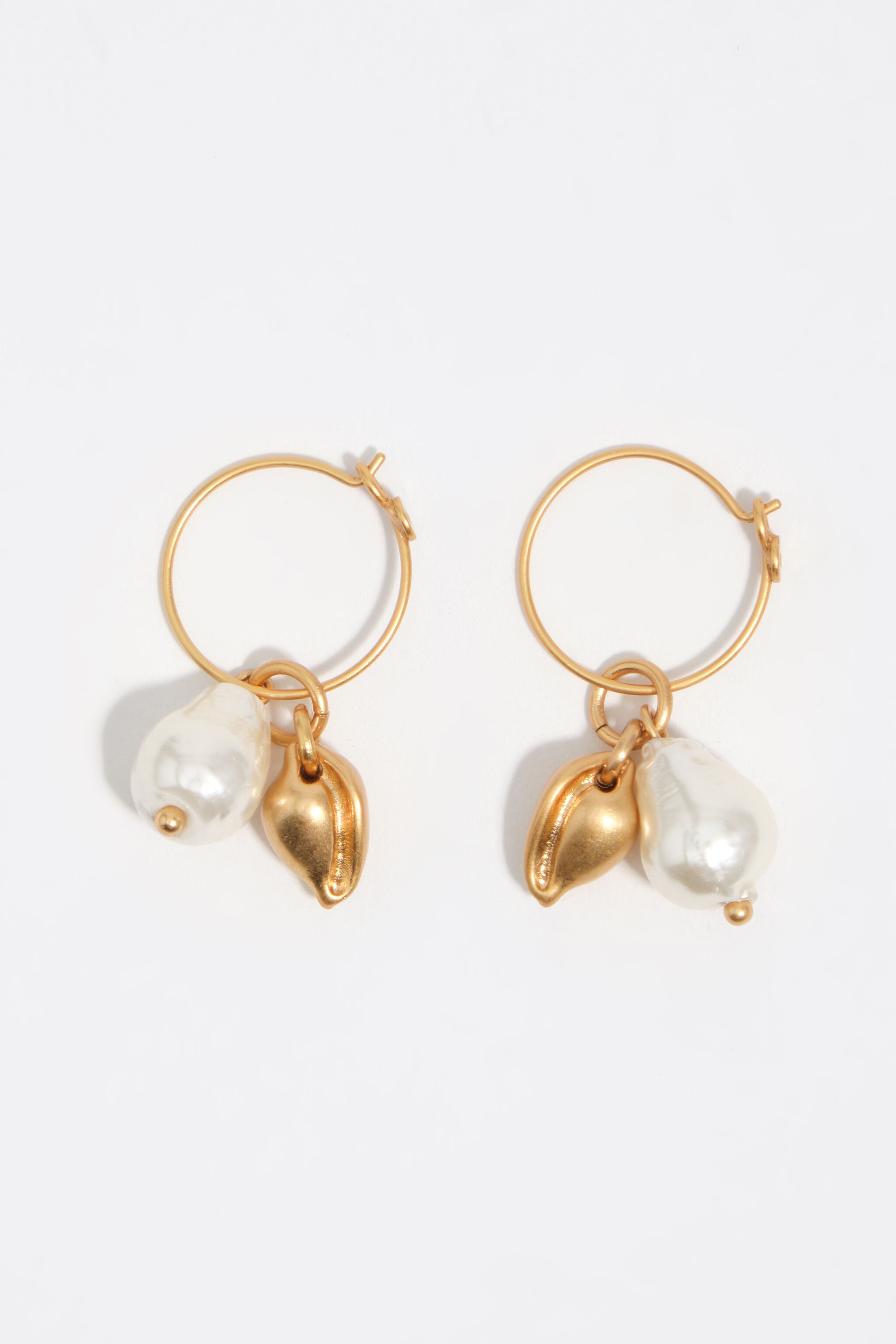 Aged gold pearl and seashell hoop earrings